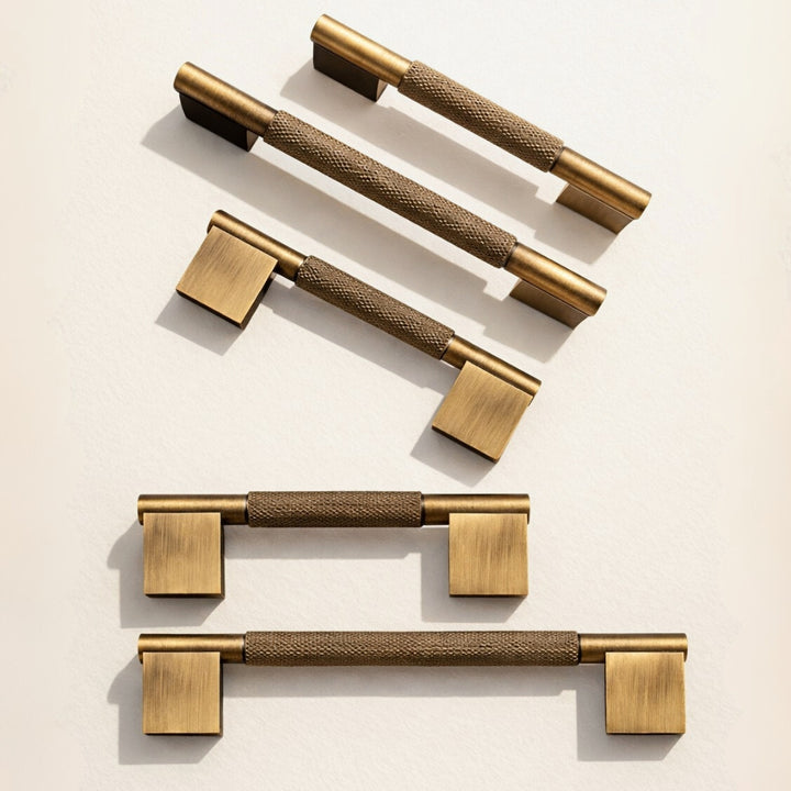 Angled view of antique brass 5-inch cabinet pull