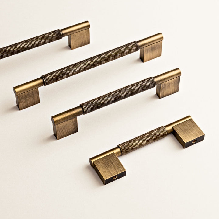 GLEAM antique brass 5-inch cabinet pull and knob set by ARCHANDLES, overhead view