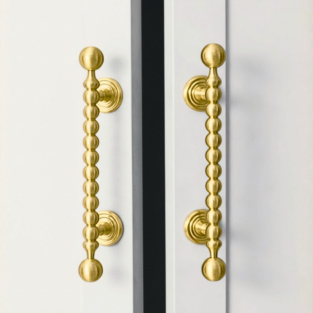 AURA brushed brass 3.75-inch cabinet knobs and pulls by ARCHANDLES