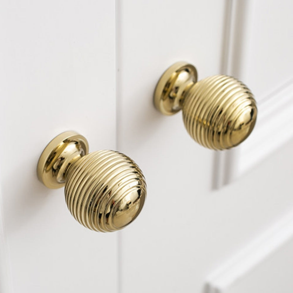 Polished gold 3.75-inch cabinet knobs and pulls — view 08