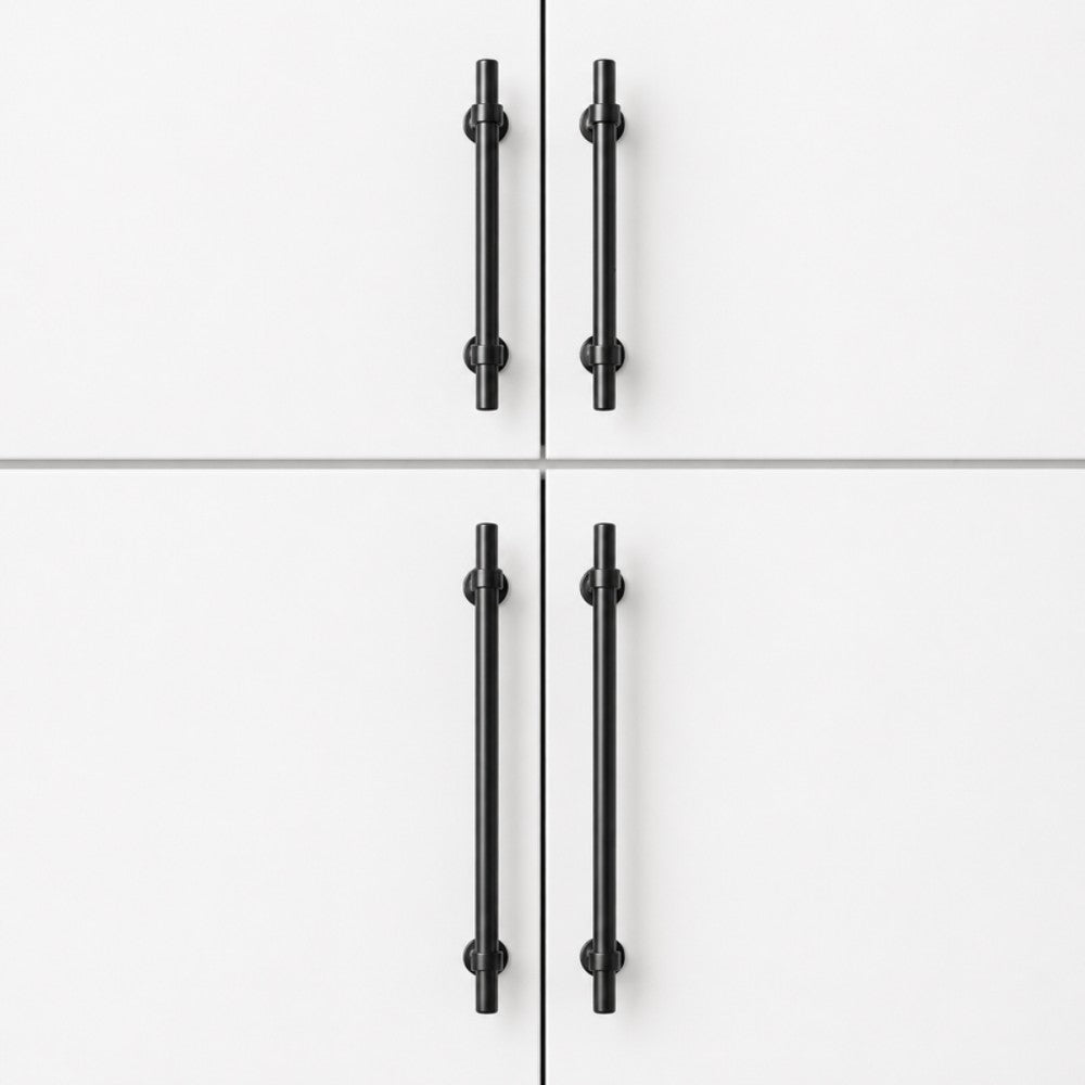 SKYE matte black bar pull on white Shaker pantry cabinet door, 256mm hole spacing
