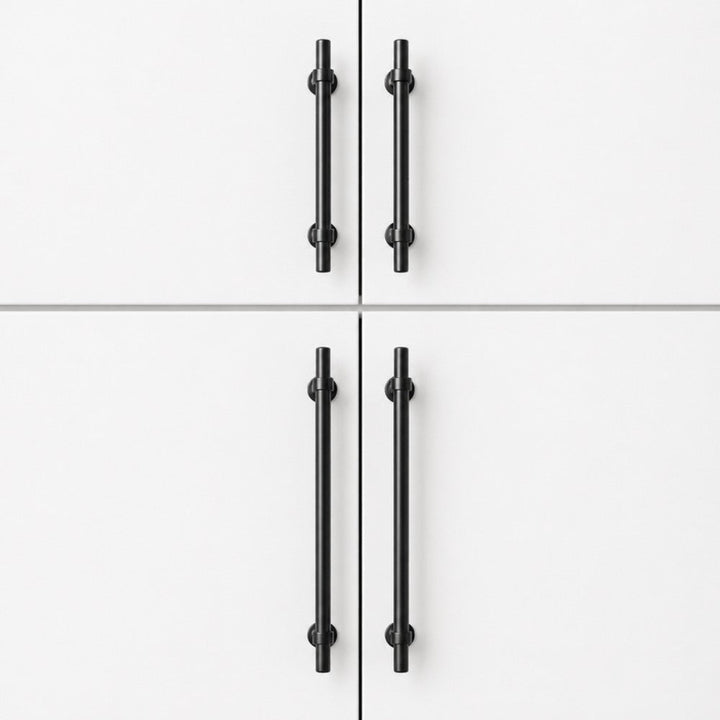 SKYE matte black bar pull on white Shaker pantry cabinet door, 256mm hole spacing