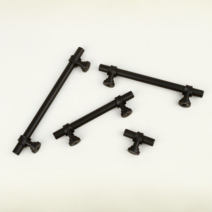 SKYE matte black cabinet pull on full-height white Shaker cabinetry